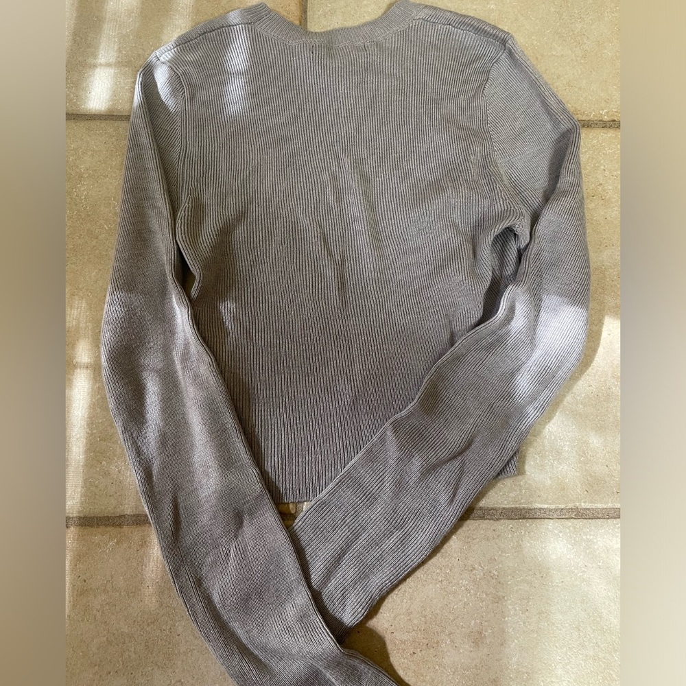 light grey sweater